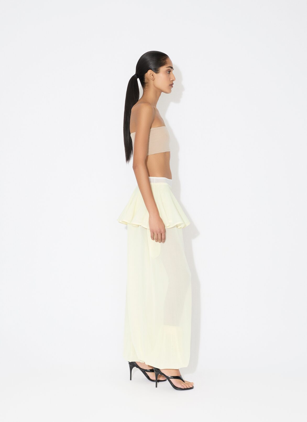KNIT PEPLUM PANTS ALAÏA YELLOW KNIT PEPLUM PANTS